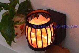 himalayansaltlampswithchunksovalmetalbasketforhomeofficehoteldecoryogapurifyingairwarmandromanticnightlightwithsolidwoodouterframe01 Salt Lamps Crafts Manufacture and Exporter