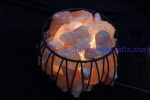 himalayansaltlampswithchunksroundmetalbasketforhomeofficehoteldecoryogapurifyingairwarmandromanticnightlightwithsolidwoodouterframe16 Copy Salt Lamps Crafts Manufacture and Exporter