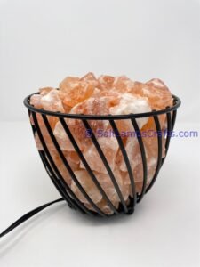 himalayansaltlampswithchunksroundmetalbasketforhomeofficehoteldecoryogapurifyingairwarmandromanticnightlightwithsolidwoodouterframe20 Copy Salt Lamps Crafts Manufacture and Exporter